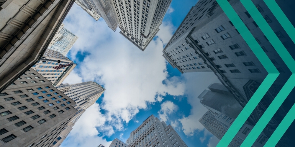 Photo looking at up New York skyscrapers from below, representing article on UK recruiter mistakes when expanding to the US